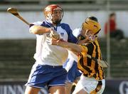 22 February 2004; Seamus Prendergast of Waterford in action against Walter Burke of Kilkenny during the Allianz Hurling League Division 1A match between Kilkenny and Waterford at Nowlan Park in Kilkenny. Photo by Ray McManus/Sportsfile