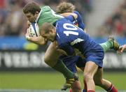 14 February 2004; Gordon D'Arcy of Ireland is tackled by Brian Liebenberg and Frederic Michalak of France during the RBS Six Nations Rugby Championship match between France and Ireland at Stade de France in Paris, France. Photo by Brendan Moran/Sportsfile