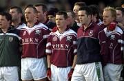 22 February 2004; The Caltra team, led by Declan Meehan, centre, stand for the national anthem prior to the AIB All-Ireland Senior Club Football Championship Semi-Final match between Caltra and Loup at Markievicz Park in Sligo. Photo by Damien Eagers/Sportsfile