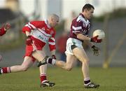 22 February 2004; Declan Meehan of Caltra in action against Fintan Martin of the Loup during the AIB All-Ireland Senior Club Football Championship Semi-Final match between Caltra and Loup at Markievicz Park in Sligo. Photo by Damien Eagers/Sportsfile