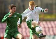25 February 2004; Paul McShane of Republic of Ireland in action against Tim Lo Duca of Slovenia during an U19 International Friendly match between Republic of Ireland and Slovenia at Dalymount Park in Dublin. Photo by David Maher/Sportsfile