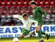 25 February 2004; Steven Foley of Republic of Ireland in action against Rok Bozic of Slovenia during an U19 International Friendly match between Republic of Ireland and Slovenia at Dalymount Park in Dublin. Photo by David Maher/Sportsfile