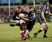27 February 2004; Christian Cullen is tackled by Stefan Terblanche of Neath Swansea Ospreys during the Celtic League match between Munster and Neath Swansea Ospreys at Musgrave Park in Cork. Photo by Damien Eagers/Sportsfile