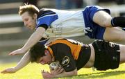 28 February 2004; David Kelly of Buccaneers scores a try despite the tackle of Tomás O'Leary of Cork Constitution during the AIB All-Ireland League Division 1 match between Cork Constitution and Buccaneers at Temple Hill in Cork. Photo by Damien Eagers/Sportsfile