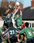 28 February 2004; Martin Mc Grath of Queens University Belfast in action against Michael Moyles of Sligo IT during the Datapac Sigerson Cup Final match between Queens University Belfast and Sligo IT at Corrigan Park in Belfast, Antrim. Photo by Sportsfile