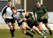 28 February 2004; Rory Kerr of Glasgow Rugby is tackled by Tom Carter of Connacht during the Celtic League match between Connacht and Glasgow Rugby at The Sportsground in Galway. Photo by Ray Ryan/Sportsfile