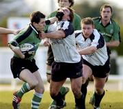 28 February 2004; Conor O'Loughlin of Connacht is tackled by Donie McFayden of Glasgow Rugby during the Celtic League match between Connacht and Glasgow Rugby at The Sportsground in Galway. Photo by Ray Ryan/Sportsfile