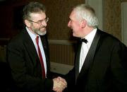28 February 2004; An Taoiseach Bertie Ahern, T.D, meets the President of Sinn Féin Gerry Adams, left, during the Cumann Camogaiocht na nGael centenary celebrations at the Citywest Hotel in Dublin. Photo by Brendan Moran/Sportsfile
