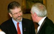 28 February 2004; An Taoiseach Bertie Ahern, T.D, meets the President of Sinn Féin Gerry Adams, left, during the Cumann Camogaiocht na nGael centenary celebrations at the Citywest Hotel in Dublin. Photo by Ray McManus/Sportsfile