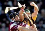 29 February 2004; Henry Shefflin of Kilkenny in action against Tony óg Regan of Galway during the Allianz Hurling League Division 1A match between Galway and Kilkenny at Pearse Stadium in Galway. Photo by David Maher/Sportsfile