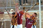 29 February 2004; Johnny O'Loughlin and Alan Kerins of Galway in action against Sean Dowling, left, and James Ryall of Kilkenny during the Allianz Hurling League Division 1A match between Galway and Kilkenny at Pearse Stadium in Galway. Photo by David Maher/Sportsfile