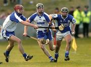 29 February 2004; James Walsh of Laois in action against Jack Kennedy of Waterford during the Allianz Hurling League Division 1A match between Waterford and Laois at Walsh Park in Waterford. Photo by Matt Browne/Sportsfile