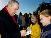 29 February 2004; Former Taoiseach Albert Reynolds signs autographs for young children during the Rás na h Éireann at Dundalk racecourse in Dundalk, Louth. Photo by Pat Murphy/Sportsfile