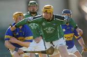29 February 2004; Niall Moran of Limerick in action against Eamon Corcoran of Tipperary during the Allianz Hurling League Division 1B match between Limerick and Tipperary at the Gaelic Grounds in Limerick. Photo by Damien Eagers/Sportsfile