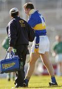 29 February 2004; Brian O'Meara of Tipperary leaves the pitch in a neck brace after picking up an injury during the Allianz Hurling League Division 1B match between Limerick and Tipperary at the Gaelic Grounds in Limerick. Photo by Damien Eagers/Sportsfile