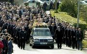 5 March 2005; The funeral cortege makes it's way to the church during the funeral of Tyrone footballer Cormac McAnallen at St Patrick's Church in Eglish, Tyrone. Photo by Ray McManus/Sportsfile
