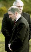 5 March 2005; Tyrone manager Mickey Harte, left, and Armagh manager Joe Kernan in attendance at the funeral of Tyrone footballer Cormac McAnallen at St Patrick's Church in Eglish, Tyrone. Photo by Ray McManus/Sportsfile