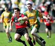 4 June 2006; Ciaran Bonner, Donegal, in action against Ronan Murtagh, Down. Bank of Ireland Ulster Senior Football Championship, First Round, Donegal v Down, McCool Park, Ballybofey, Co. Donegal. Picture credit; Oliver McVeigh / SPORTSFILE