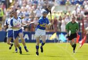 4 June 2006; Ken Dunne, Tipperary, in action against Paul Flynn, Waterford. Guinness Munster Senior Hurling Championship, Semi-Final, Waterford v Tipperary, Pairc Ui Chaoimh, Cork. Picture credit; Damien Eagers / SPORTSFILE