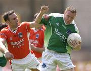 11 June 2006; Mark Murphy, Fermanagh, in action against Enda McNulty, Armagh. Bank of Ireland Ulster Senior Football Championship, Semi-Final, Armagh v Fermanagh, St. Tighernach's Park, Clones, Co. Monaghan. Picture credit: David Maher / SPORTSFILE