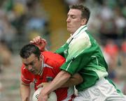 11 June 2006; Oisin McConville, Armagh, in action against Shane Goan, Fermanagh. Bank of Ireland Ulster Senior Football Championship, Semi-Final, Armagh v Fermanagh, St. Tighernach's Park, Clones, Co. Monaghan. Picture credit: Oliver McVeigh / SPORTSFILE