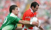 11 June 2006; Steven McDonnell, Armagh, in action against Ryan McCluskey, Fermanagh. Bank of Ireland Ulster Senior Football Championship, Semi-Final, Armagh v Fermanagh, St. Tighernach's Park, Clones, Co. Monaghan. Picture credit: Oliver McVeigh / SPORTSFILE