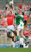 11 June 2006; Malachy Mackin, Armagh, in action against Mark Murphy, Fermanagh. Bank of Ireland Ulster Senior Football Championship, Semi-Final, Armagh v Fermanagh, St. Tighernach's Park, Clones, Co. Monaghan. Picture credit: Oliver McVeigh / SPORTSFILE