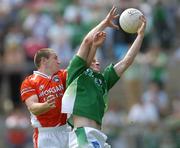11 June 2006; Tom Brewster, Fermanagh, in action against JP Donnelly, Armagh. Bank of Ireland Ulster Senior Football Championship, Semi-Final, Armagh v Fermanagh, St. Tighernach's Park, Clones, Co. Monaghan. Picture credit: David Maher / SPORTSFILE