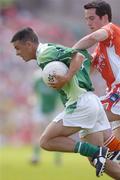 11 June 2006; Mark Little, Fermanagh, in action against Aaron Kernan, Armagh. Bank of Ireland Ulster Senior Football Championship, Semi-Final, Armagh v Fermanagh, St. Tighernach's Park, Clones, Co. Monaghan. Picture credit: David Maher / SPORTSFILE