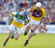 11 June 2006; Brian Carroll, Offaly, in action against David O'Connor, Wexford. Guinness Leinster Senior Hurling Championship, Semi-Final, Offaly v Wexford, Nowlan Park, Kilkenny. Picture credit: Damien Eagers / SPORTSFILE
