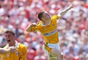 11 June 2006; Conor McGourty, Antrim, celebrates after scoring his side's winning point. E.S.B Ulster Minor Football Championship, Semi-Final, Armagh v Antrim, St. Tighernach's Park, Clones, Co. Monaghan. Picture credit: David Maher / SPORTSFILE