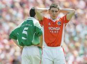 11 June 2006; Brian Mallon, Armagh, and Raymond Johnston, Fermanagh, at the end of the game. Bank of Ireland Ulster Senior Football Championship, Semi-Final, Armagh v Fermanagh, St. Tighernach's Park, Clones, Co. Monaghan. Picture credit: David Maher / SPORTSFILE