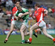 11 June 2006; Paul McGrane, Armagh, in action against Liam McBarron, Fermanagh. Bank of Ireland Ulster Senior Football Championship, Semi-Final, Armagh v Fermanagh, St. Tighernach's Park, Clones, Co. Monaghan. Picture credit: Oliver McVeigh / SPORTSFILE