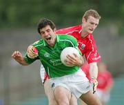 11 June 2006; John Galvin, Limerick, in action against Nicholas Murphy, Cork. Bank of Ireland Munster Senior Football Championship, Semi-Final, Limerick v Cork, Gaelic Grounds, Limerick. Picture credit: Kieran Clancy / SPORTSFILE