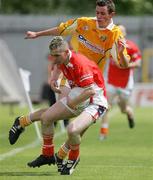 11 June 2006; Stephen Finnegan, Armagh, in action against Sean Burke, Antrim. E.S.B Ulster Minor Football Championship, Semi-Final, Armagh v Antrim, St. Tighernach's Park, Clones, Co. Monaghan. Picture credit: Oliver McVeigh / SPORTSFILE