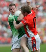 11 June 2006; Francie Bellew, Armagh, in action against Tom Brewster, Fermanagh. Bank of Ireland Ulster Senior Football Championship, Semi-Final, Armagh v Fermanagh, St. Tighernach's Park, Clones, Co. Monaghan. Picture credit: Oliver McVeigh / SPORTSFILE