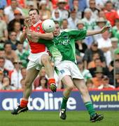 11 June 2006; Ciaran McKeever, Armagh, in action against Mark Murphy, Fermanagh. Bank of Ireland Ulster Senior Football Championship, Semi-Final, Armagh v Fermanagh, St. Tighernach's Park, Clones, Co. Monaghan. Picture credit: Oliver McVeigh / SPORTSFILE