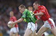 11 June 2006; Seanie Buckley, Limerick, in action against Noel O'Leary, Cork. Bank of Ireland Munster Senior Football Championship, Semi-Final, Limerick v Cork, Gaelic Grounds, Limerick. Picture credit: Brian Lawless / SPORTSFILE
