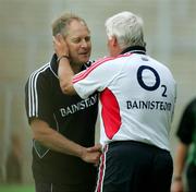 11 June 2006; Limerick manager Mickey 'Ned' O'Sullivan congratulates Cork manager Billy Morgan at the end of the game. Bank of Ireland Munster Senior Football Championship, Semi-Final, Limerick v Cork, Gaelic Grounds, Limerick. Picture credit: Kieran Clancy / SPORTSFILE