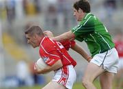 11 June 2006; Daniel Goulding, Cork, in action against Anthony Lynch, Limerick. Bank of Ireland Munster Senior Football Championship, Semi-Final, Limerick v Cork, Gaelic Grounds, Limerick. Picture credit: Brian Lawless / SPORTSFILE