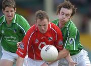 11 June 2006; James Masters, Cork, in action against Stephen Lavin, right, and Padraig Browne, Limerick. Bank of Ireland Munster Senior Football Championship, Semi-Final, Limerick v Cork, Gaelic Grounds, Limerick. Picture credit: Brian Lawless / SPORTSFILE
