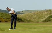 12 June 2006; Adrian Morrow, Portmarnock G.C., plays from the 12th fairway during the Irish Amateur Close Championship. European Club Golf Club, Brittas Bay, Co. Wicklow, Picture credit: Pat Murphy / SPORTSFILE