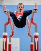 13 June 2014; 13-year-old Tadhg O'Sullivan, Whitechurch, Co. Cork, Team Munster, competing in the Horizontal Bar heats. Special Olympics Ireland Games, University of Limerick, Limerick.  Picture credit: Diarmuid Greene / SPORTSFILE