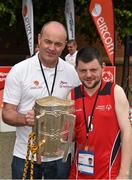 13 June 2014; Team Munster basketballer Michael Carr, from Dooradoyle, Limerick, with Dublin hurling manager Anthony Daly and the Liam MacCarthy cup at the UL Sport Arena. Special Olympics Ireland Games, University of Limerick, Limerick. Picture credit: Diarmuid Greene / SPORTSFILE