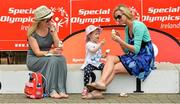 13 June 2014; Team Munster supporters, from left to right, Noelle Barry, her daughter Kate Cantwell, aged 2 and a half, and Elaine Barry, from Ballinacurra, Limerick, enjoying some ice-cream at the UL Sport Arena. Special Olympics Ireland Games, University of Limerick, Limerick. Picture credit: Diarmuid Greene / SPORTSFILE