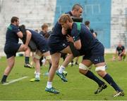 13 June 2014; Ireland's Felix Jones is tackled by Chris Henry during the captain's run ahead of their second test match against Argentina on Saturday. Ireland Rugby Captain's Run, Estadio José Fierro, Tucumán, Argentina. Picture credit: Stephen McCarthy / SPORTSFILE