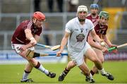 14 June 2014; Martin Fitzgerald, Kildare, in action against Philip Gilsenan, left, and Niall O'Brien, Westmeath. GAA All-Ireland Hurling Senior Championship Promotion Play Off, Westmeath v Kildare, Cusack Park, Mullingar, Co. Westmeath. Picture credit: Piaras Ó Mídheach / SPORTSFILE
