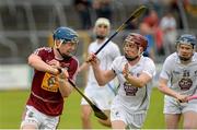 14 June 2014; Tommy Doyle, Westmeath, in action against Gerry Keegan and Ryan Casey, right, Kildare. GAA All-Ireland Hurling Senior Championship Promotion Play Off, Westmeath v Kildare, Cusack Park, Mullingar, Co. Westmeath. Picture credit: Piaras Ó Mídheach / SPORTSFILE