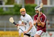 14 June 2014; Gary Greville, Westmeath, in action against Tony Murphy, Kildare. GAA All-Ireland Hurling Senior Championship Promotion Play Off, Westmeath v Kildare, Cusack Park, Mullingar, Co. Westmeath. Picture credit: Piaras Ó Mídheach / SPORTSFILE
