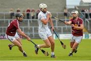 14 June 2014; Paul Divilly, Kildare, in action against Aaron Craig, left, and Gary Greville, Westmeath. GAA All-Ireland Hurling Senior Championship Promotion Play Off, Westmeath v Kildare, Cusack Park, Mullingar, Co. Westmeath. Picture credit: Piaras Ó Mídheach / SPORTSFILE